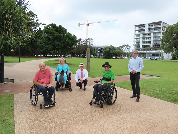 People using an accessible footpath